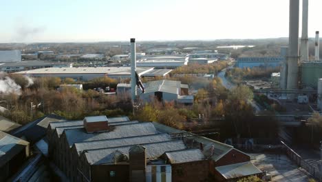 pilkington glass factory warehouse buildings rooftops aerial view across industrial town manufacturing facility