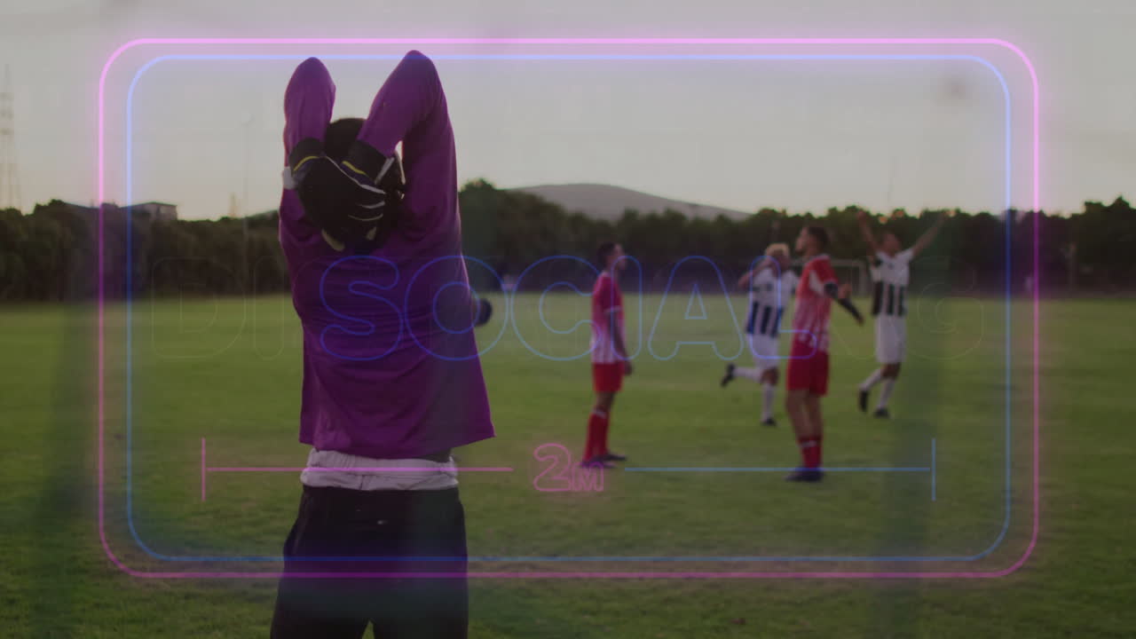 Reacting on field, soccer player in purple jersey while others celebrate animation