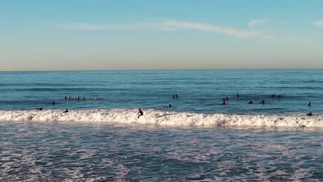 san clemente surfers, golden hour at beautiful california beach