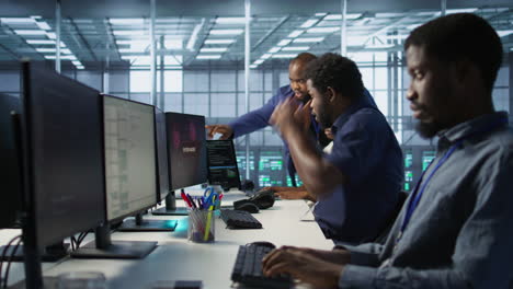 diverse team working in a data center