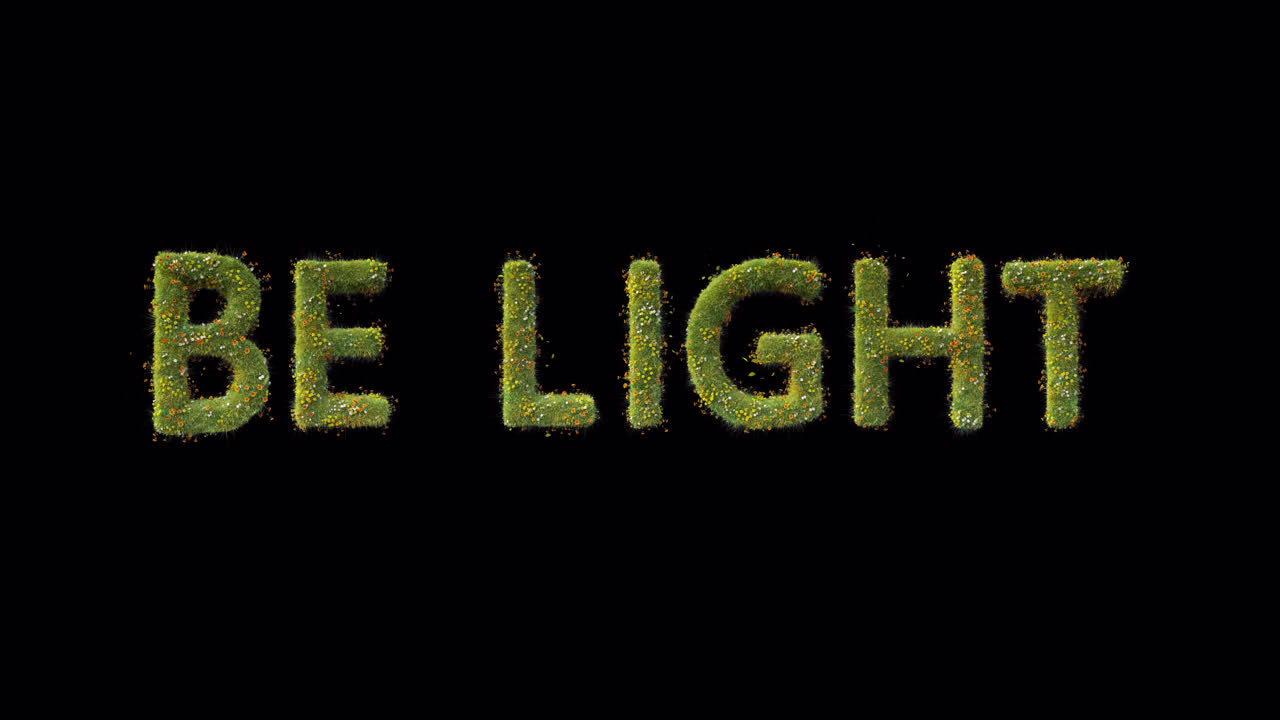 Testo 'Be Light' che cresce da erba verde e fiori