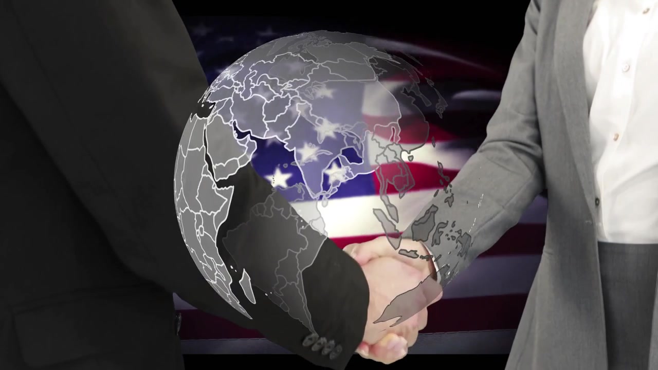 Deux partenaires se serrant les mains, un globe tournant au-dessus d'un drapeau américain, scellant un accord.