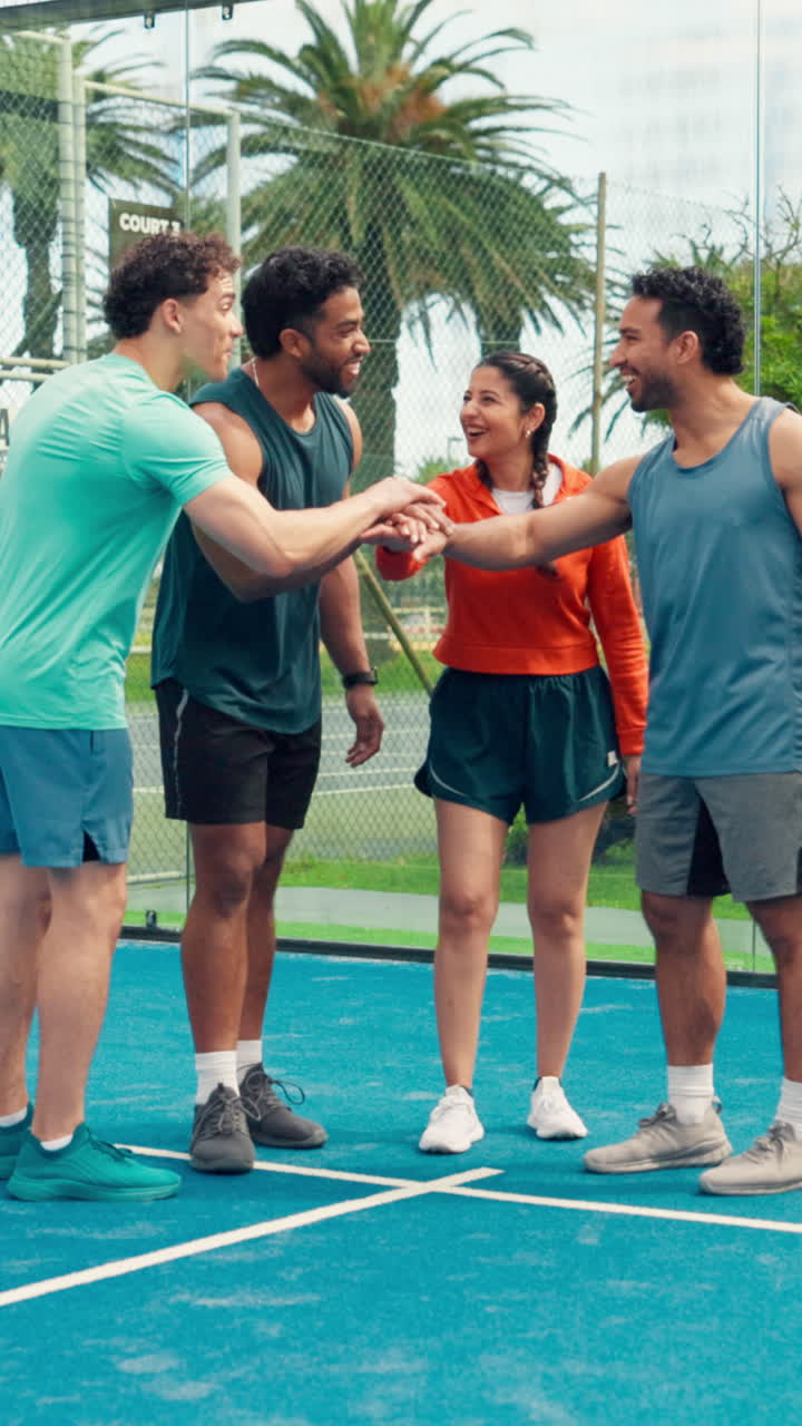 Diverse Group of Friends Huddling and Clapping on a Sports Court