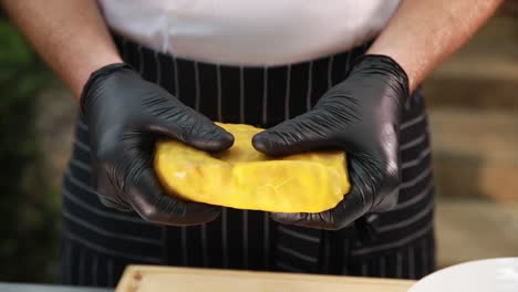 chef preparing and handling a piece of meat