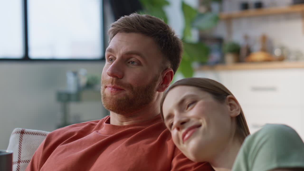 Affectionate soulmates relaxing together at couch closeup. Carefree man talking