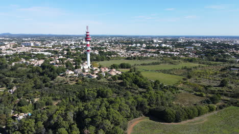 montpellier's urban spread with central radio tower.