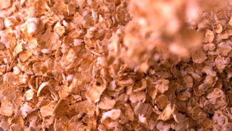 cereal flakes pouring onto more