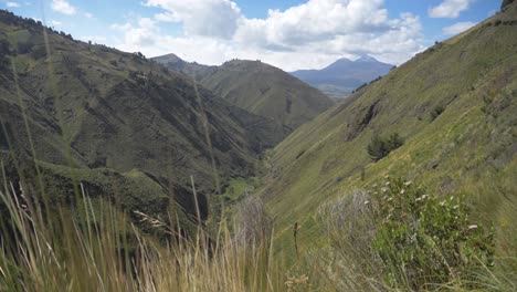 experience the grandeur of illinizas volcano and highland beauty in 4k sunny mountain scene with lush highland grass