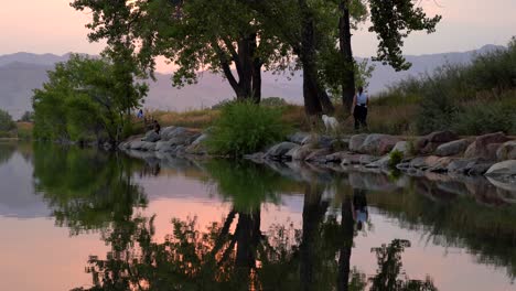 reflection of sunset over lake surface during wildfires of late august 2020 in colorado