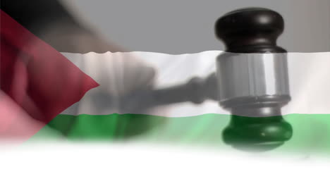 animation of flag of palestine over caucasian male judge using gavel