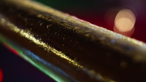 Close-up-mist-forming-on-a-piece-of-wood-creating-a-nice-reflection