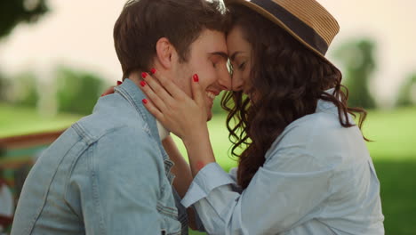 sweet couple showing tenderness on picnic