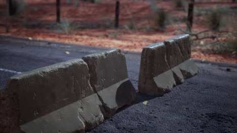 old rusted concrete road barrier blocks