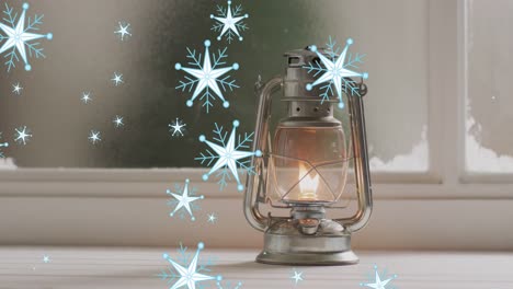 animación de la nieve cayendo sobre la decoración de la linterna de navidad.
