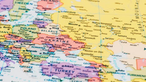 Close-up-of-the-country-word-Ukraine-on-a-world-map-with-the-detailed-name-of-the-capital-city