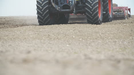 agriculture agricultural tractor sowing and cultivating field close up