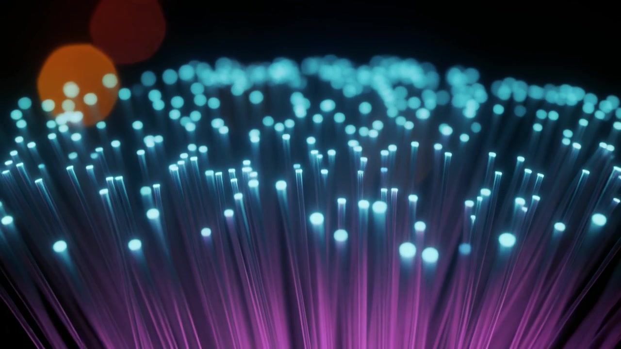 Glowing Fiber Optic Cables Transmitting Data
