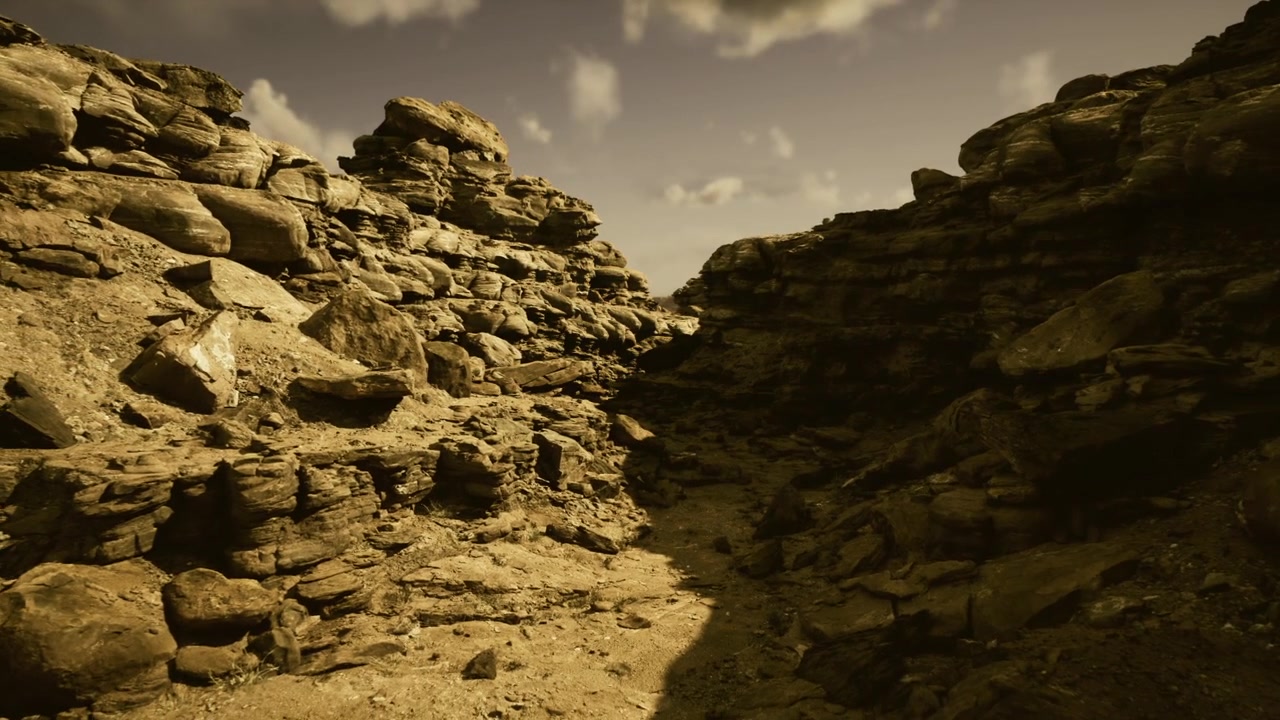 Eroded desert trail extending into dramatic rocky canyon picturesque scene