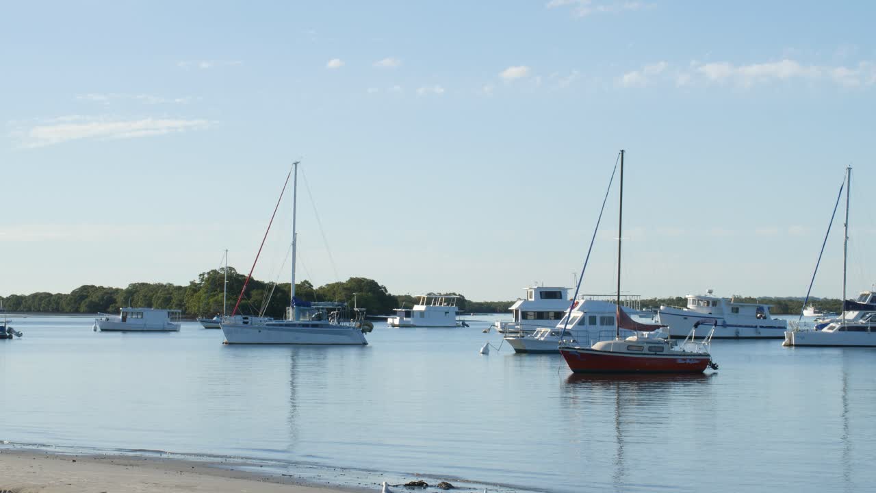 Boats Moored at Seaside Town Beach Afternoon in Gold Coast, Queensland, Australia