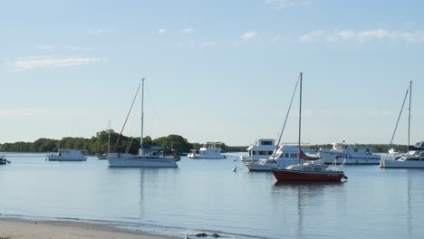 Boats-Moored-at-Seaside-Town-Beach-Afternoon-in-Gold-Coast,-Queensland,-Australia