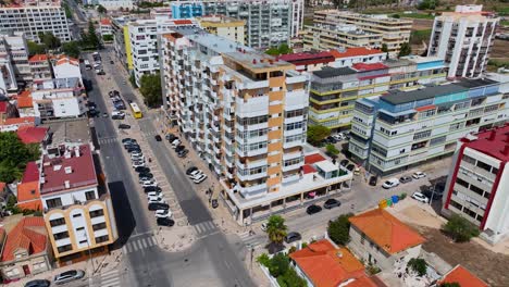 drone shot parallexing over a building in costa da caparica