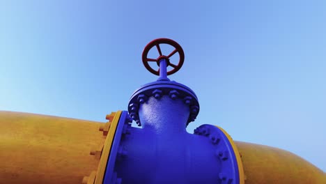 yellow gas pipe against the blue sky