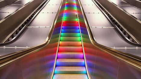 modern colorful infinity moving escalator at underground subway.