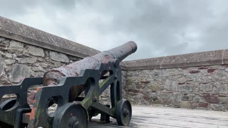 Time-Lapse---Motion-Lapse-of-an-old-Canon-on-a-Stone-Fords-Wall