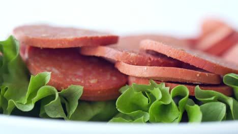 sliced sausage with lettuce