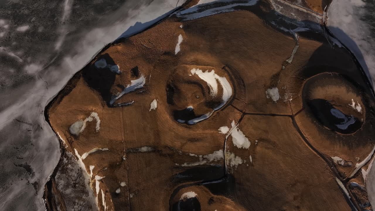 aerial view of frozen pseudocraters near Skútustaðir village on Mývatn lake in northern Iceland