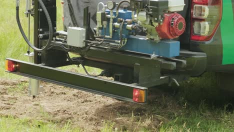 soil sampling. a vehicle with special equipment collects soil samples for analysis. soil sampling high rainfall pastures. soil examination