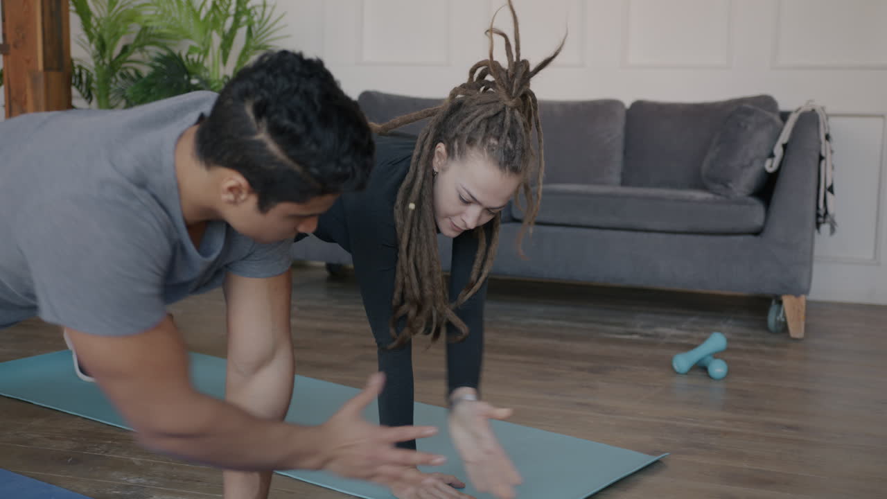 Couple Doing Push-Ups at Home