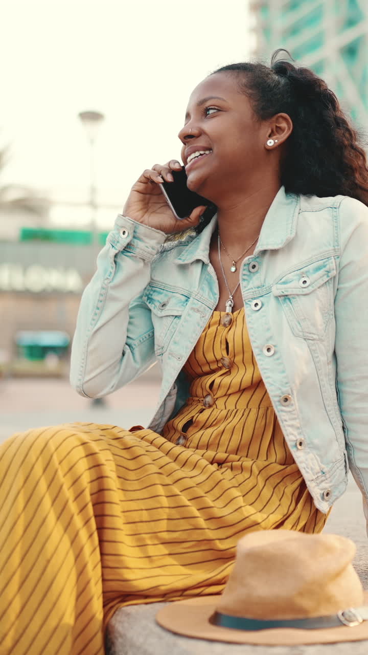 Woman talking on phone outdoors
