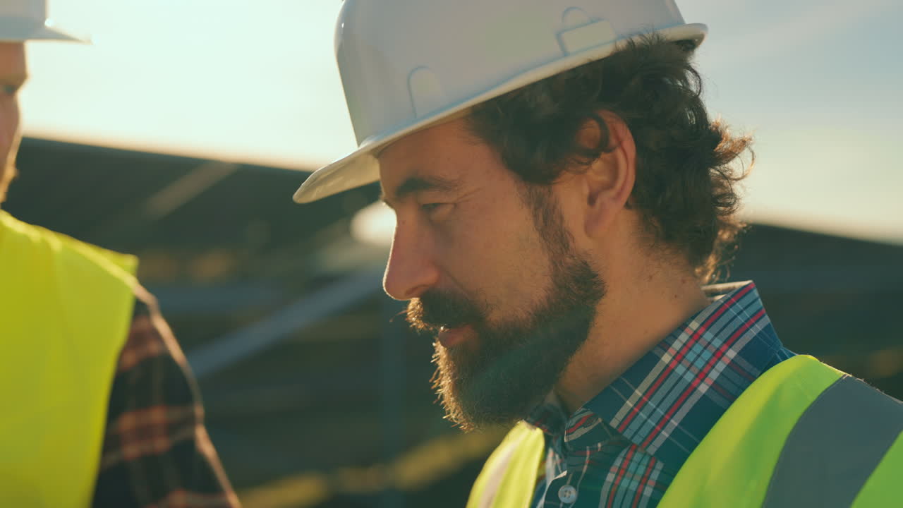 Engineers Inspecting Solar Panels