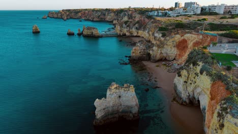 stunning aerial view of coastal cliffs and turquoise waters in portugal