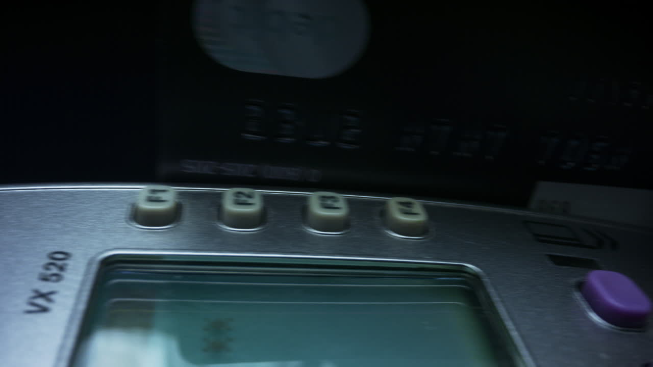 Woman hand swiping credit card in payment terminal. Female paying by debit card