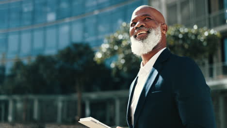mature man, tablet and outside of office park