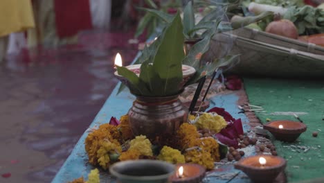 holy-offerings-of-burning-clay-oil-lamp-for-hindu-god-at-festival-from-unique-perspective