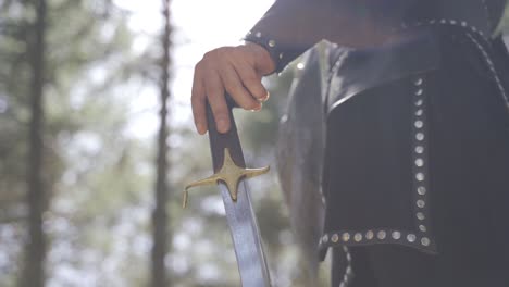 sword with the sign of the cross.