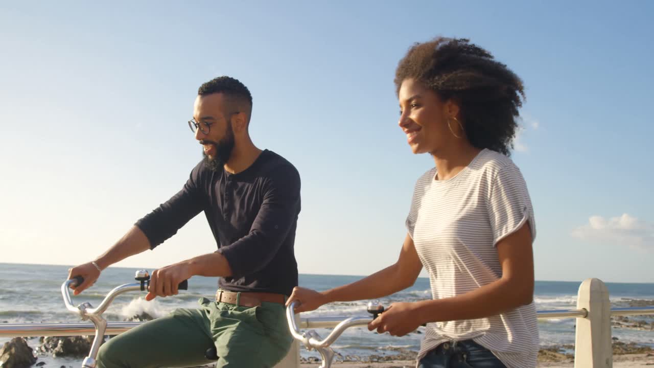 Couple interacting with each other while cycling 4k