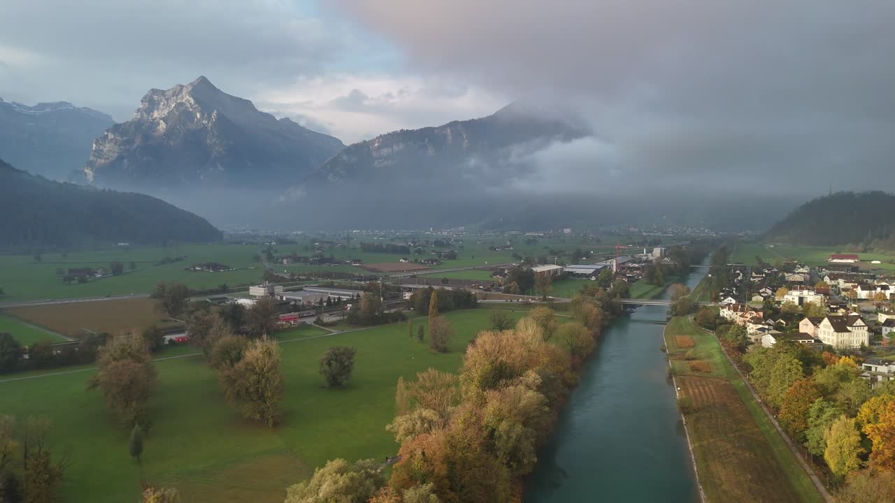 Stunning Aerial View of a River Valley in the Swiss Alps