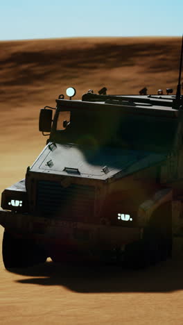 armored military truck in the desert