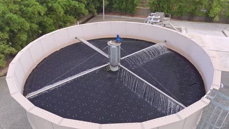 aerial view of sprinkling water at wastewater treatment plant in prados de san luis dominican republic