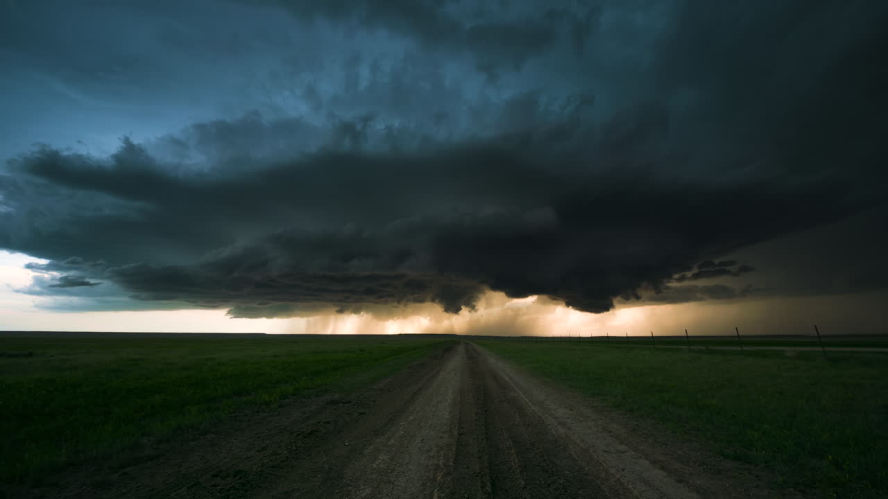 Massive Storm Clouds Over a Country Road