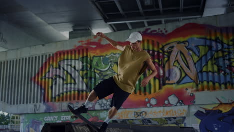 Active-skateboarder-preparing-skate-board-competition-on-ramp-at-skate-park.