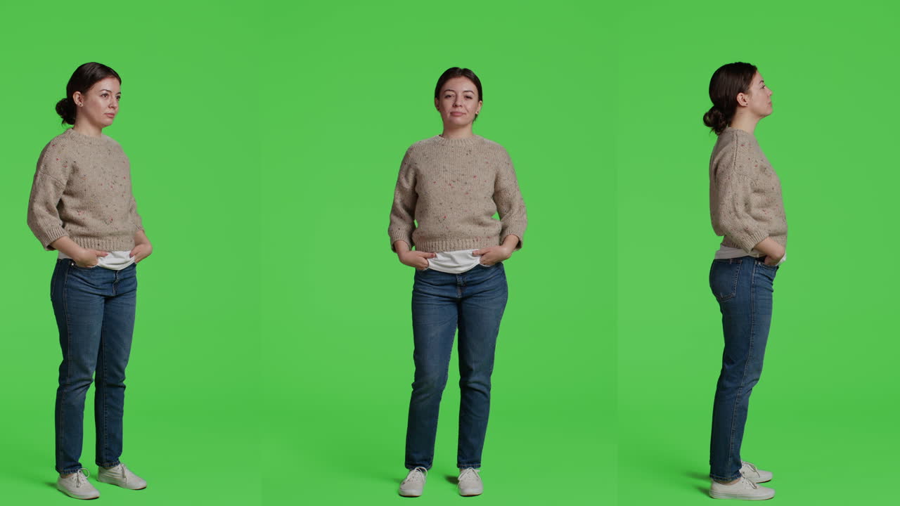 Woman in Sweater and Jeans on Green Screen