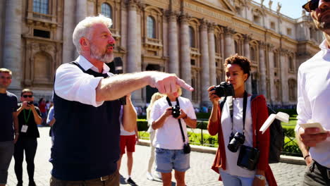 tour guide at st. peter's square, vatican city