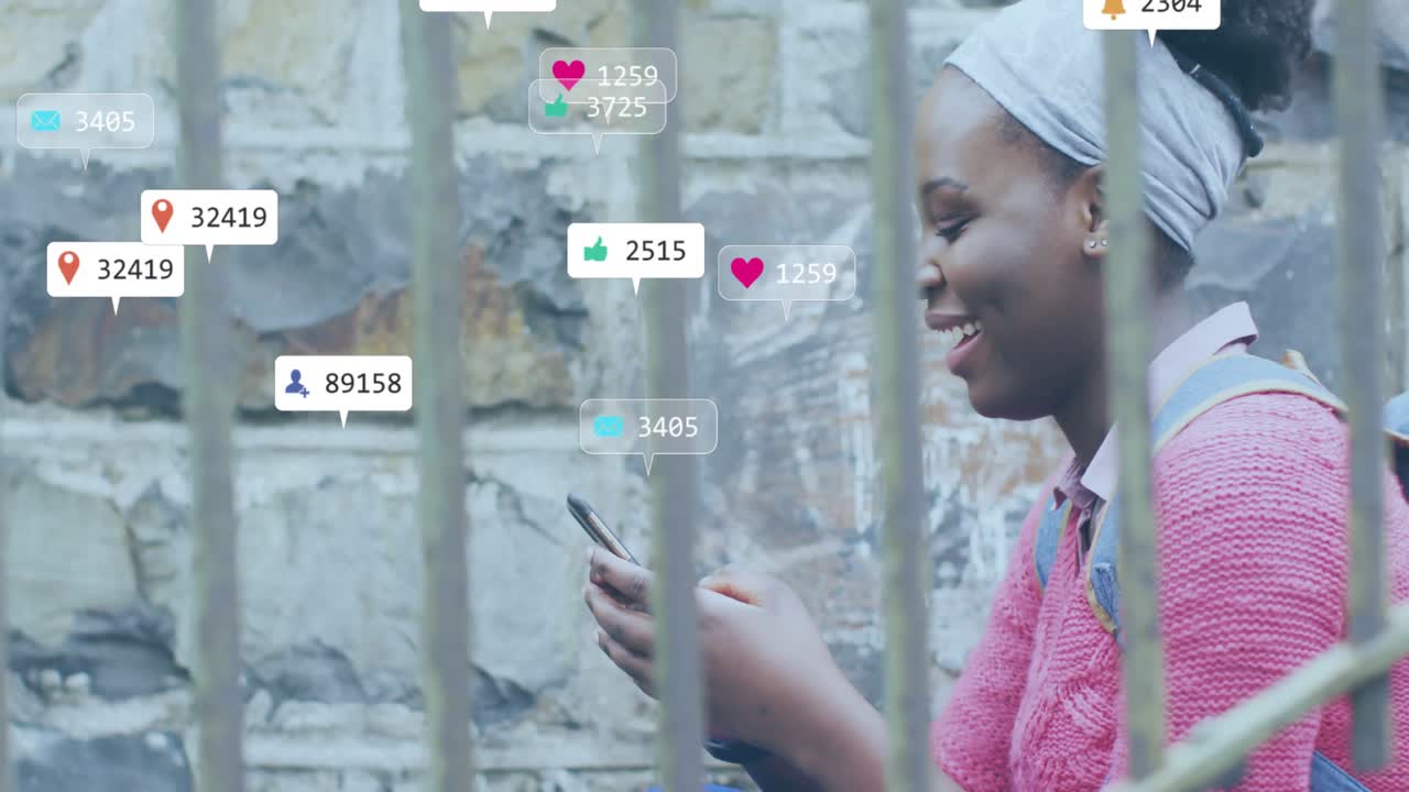Animation of icons and data processing over african american woman using smartphone
