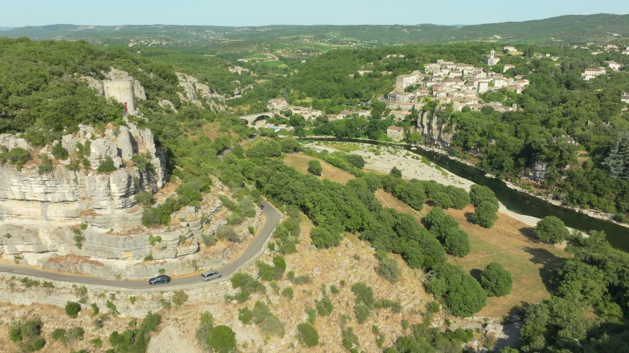 Cars Passing on Narrow Roads Towards Balazuc Village Aerial View