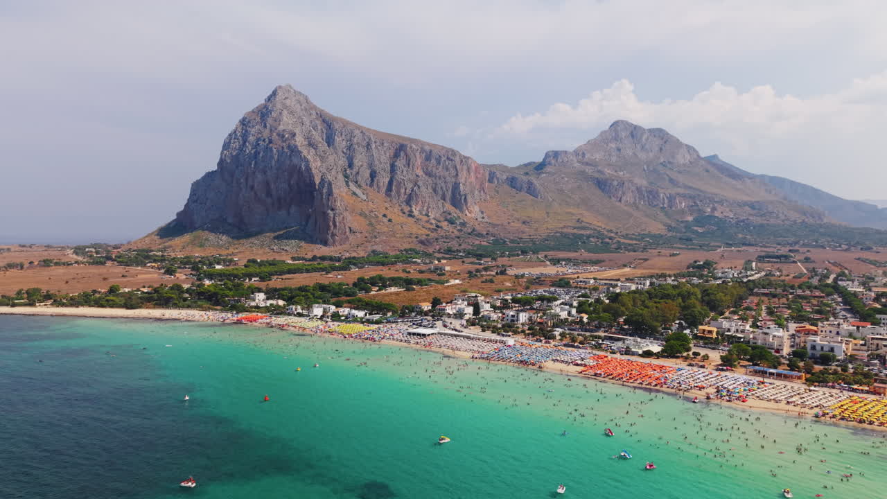 Aerial view of San Vito Lo Capo beach, Sicily, with mountains